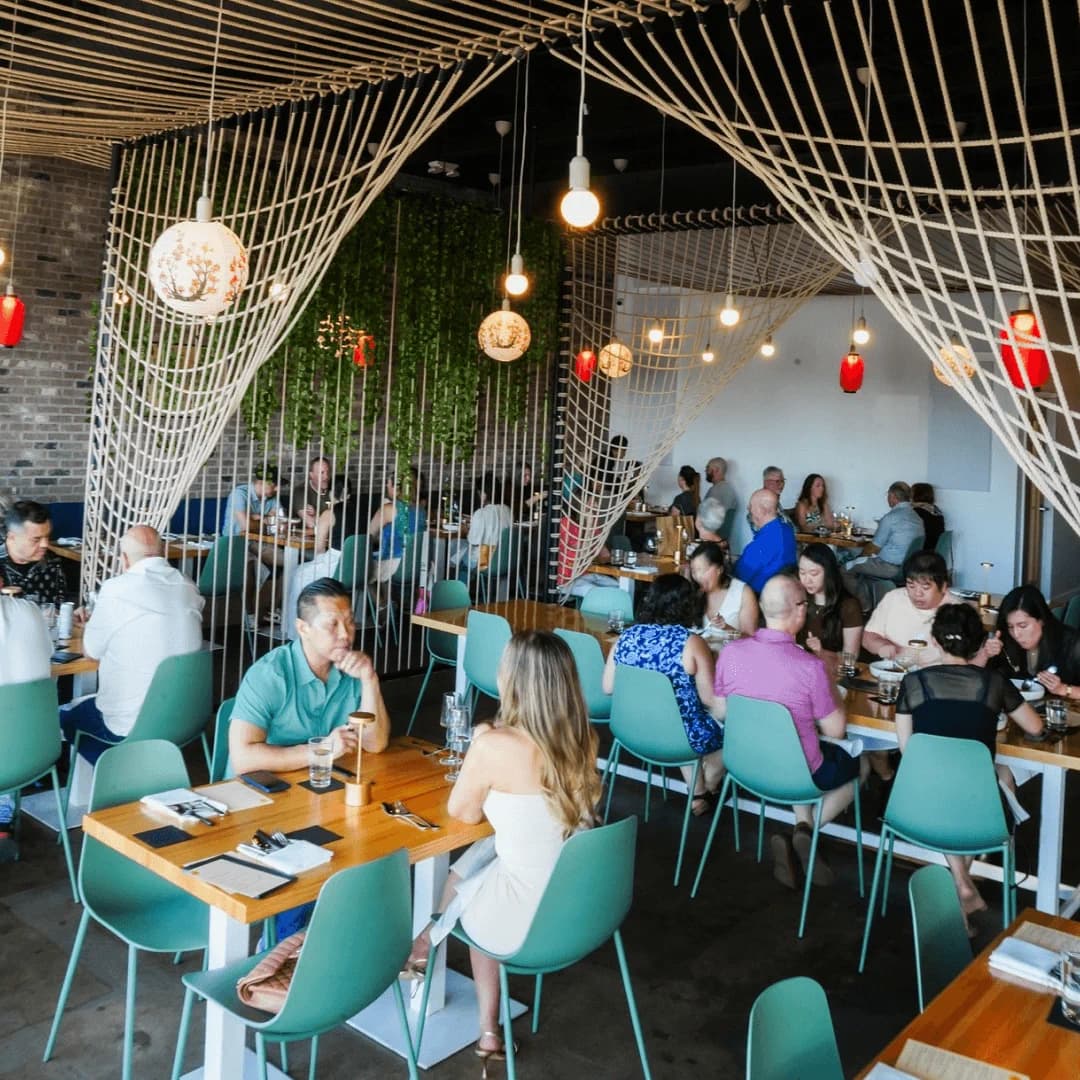 Happy guests dining at The Blind Goat